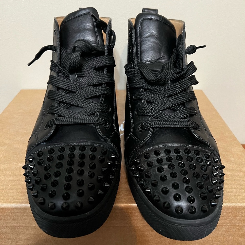 CHRISTIAN LOUBOUTIN SPIKES FLAT CALF